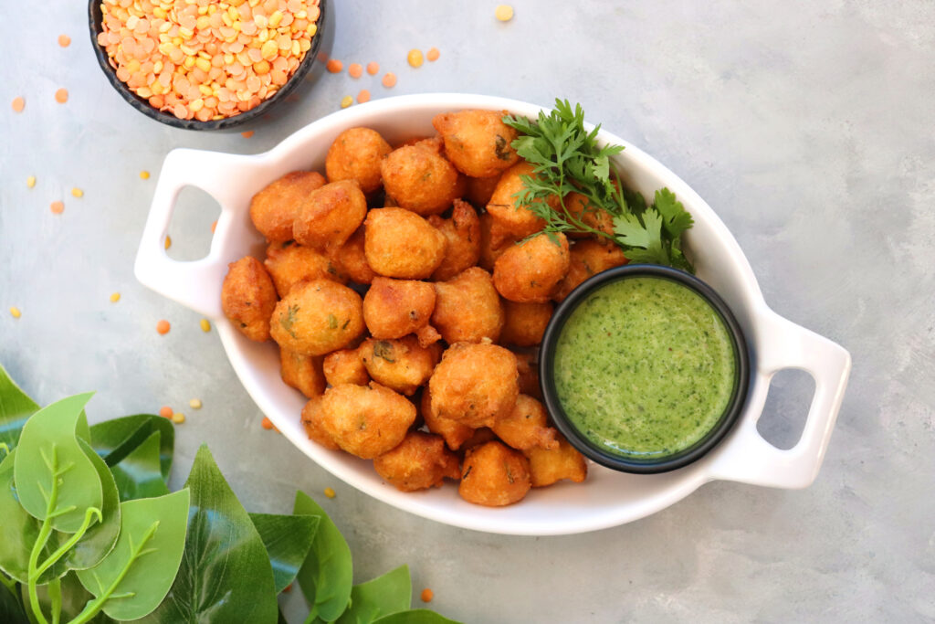 Spiced Moong Dhal Fritters with coriander and mint chutney, a vibrant, protein-rich, naturally gluten-free dish made in the Power of Pulses class.